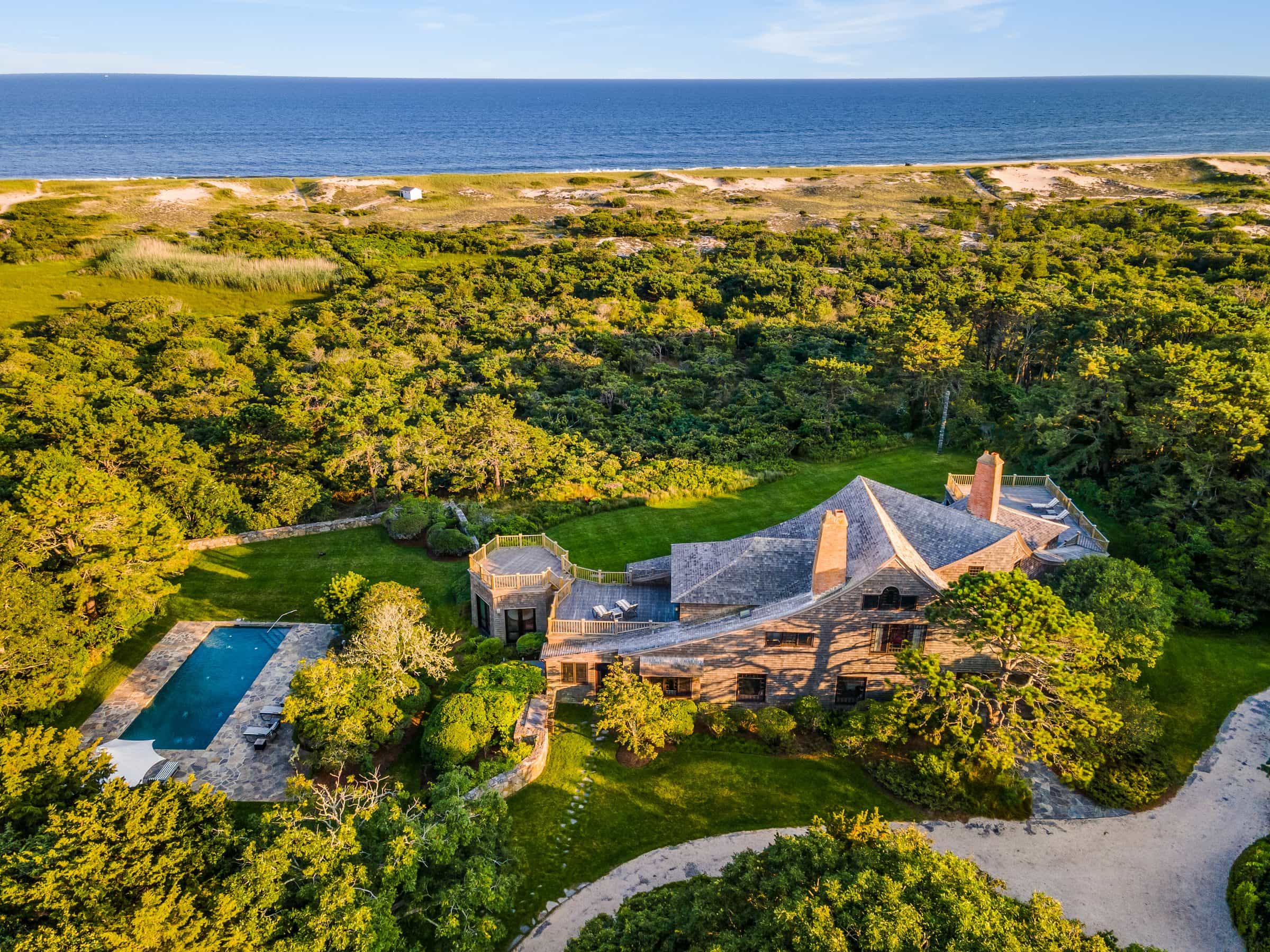 442 Further Lane, East Hampton, a Hedgerow transaction, with the Atlantic beyond, in black and white